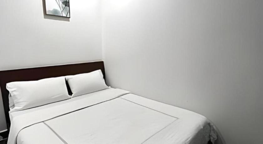 Oyo 90936 Hotel Manjoi Inn איפוה מראה חיצוני תמונה